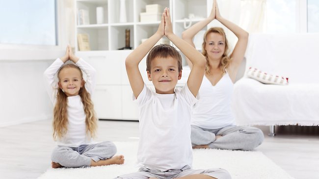 Family members meditating