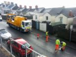 A Swansea man won a parking ticket battle with the council, who struck back by sending council workmen to paint double yellow lines on the space outside his house