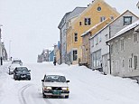 Good excuse: A boy drove off a snowy road in Norway, after he stole his parents car. When police found him he told them he was a dwarf who forgot his driver's licence