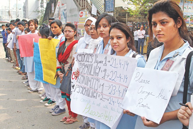 Higher secondary certificate candidates form a human chain before Jatiya Press Club in the capital yesterday demanding rescheduling four exams with adequate days in between so that they get enough time for final preparations. The exams are scheduled to be held on four consecutive days starting April 21. Photo: Star