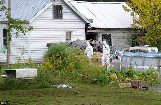 Search: On Sunday, investigators continued to collect evidence from their home in Hermon, New York